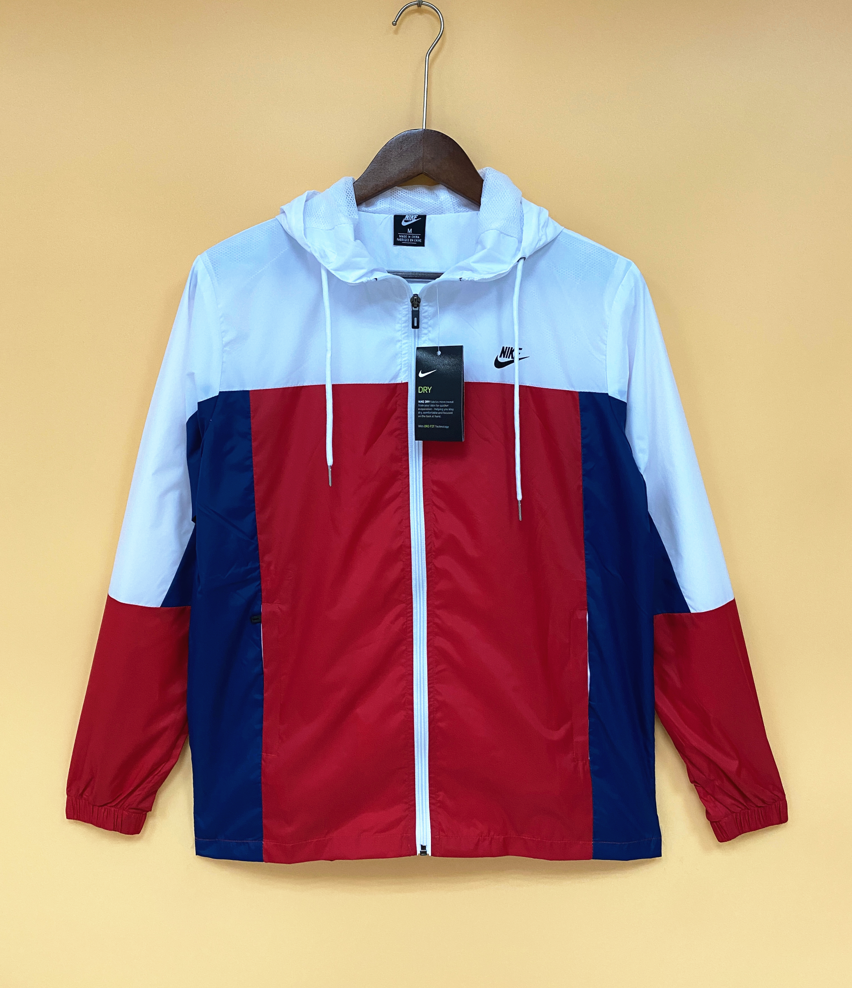 NIKE RED AND WHITE WINDBREAKER