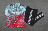 002-123 23-24 Real Madrid green with red half zipper training tracksuit