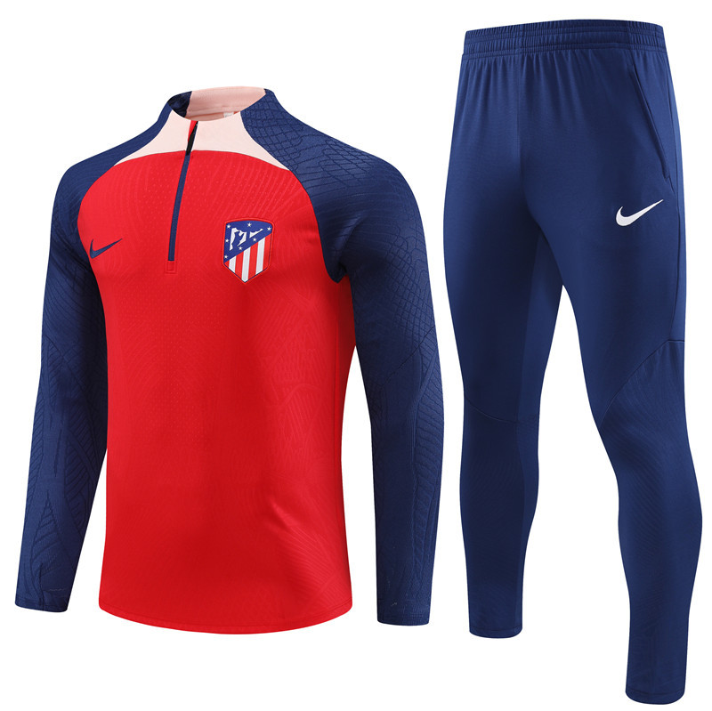 002-318 Player version 23-24 ATM red with navy blue half zipper training tracksuit