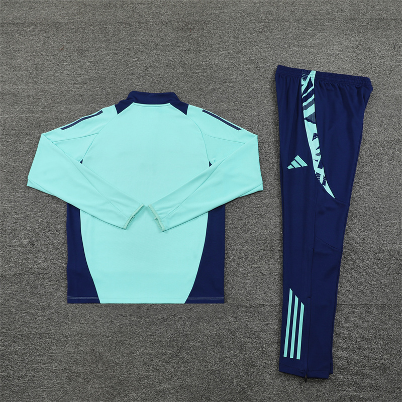 24-25 Manud light blue with navy blue half zipper training tracksuit