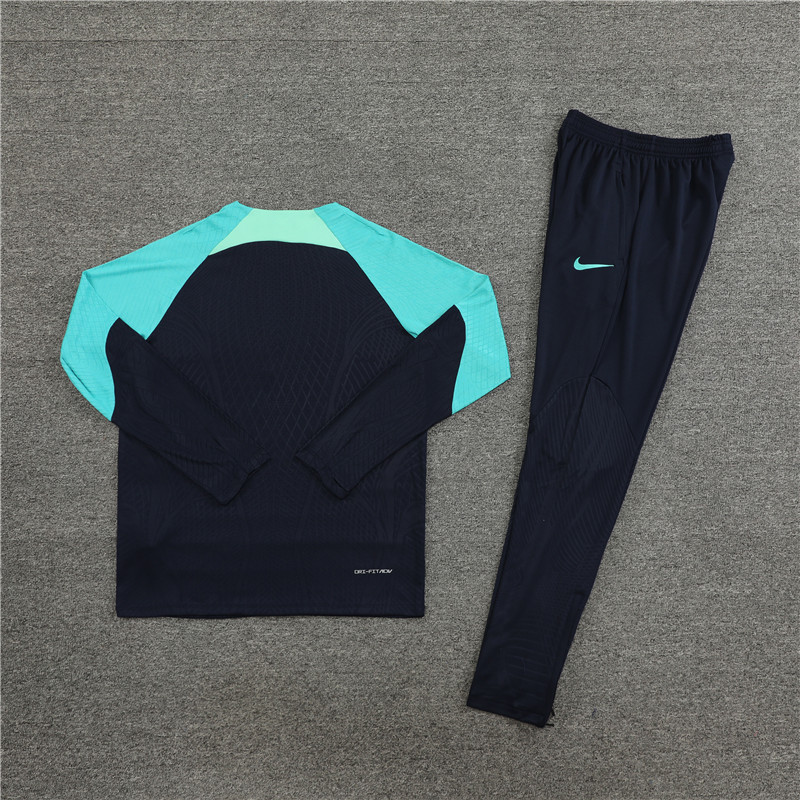player version 23-24 Bar navy blue with lake blue half zipper training tracksuit