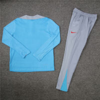 player version 24-25 ATM light blue with gray half zipper training tracksuit