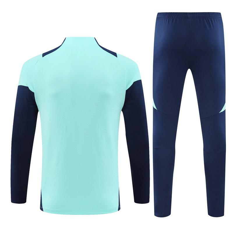 006-264 player version 24-25 Arsenal lake blue with navy blue pullover training tracksuit