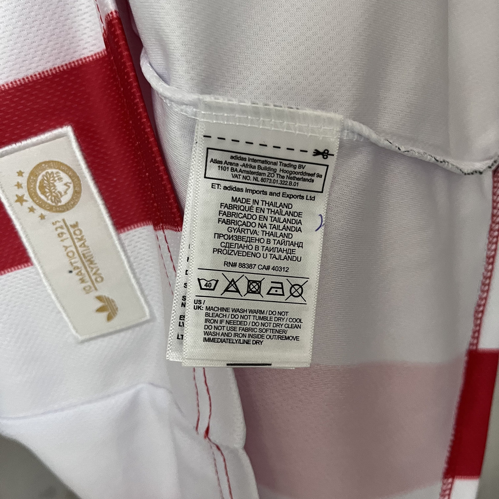 1495d63fb35d46aeb2a24acacdaea7ff 2025-26 Olympiacos 100th Anniversary Edition Red and White Jersey