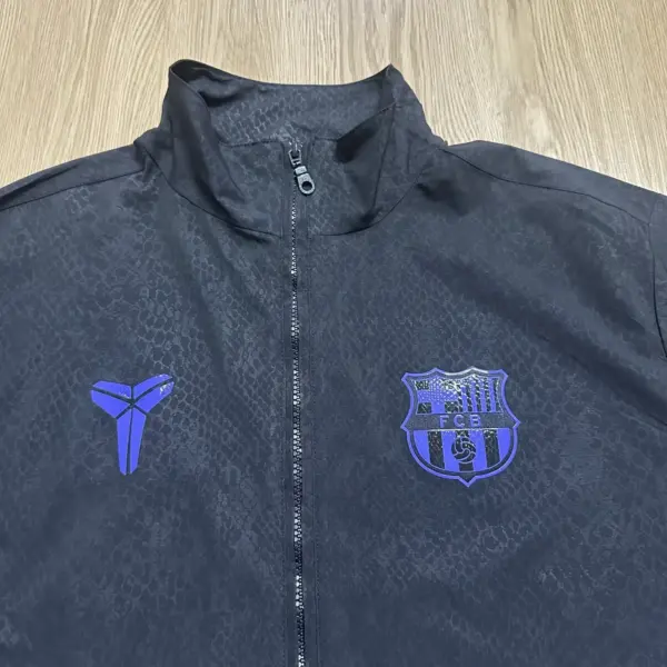 B- black windbreaker jacket