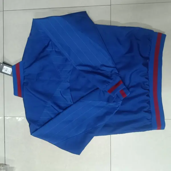 B- blue windbreaker jacket