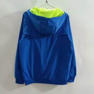 B-- blue windbreaker jacket