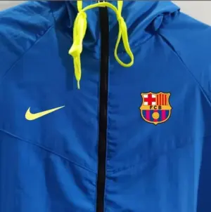 B-- blue windbreaker jacket