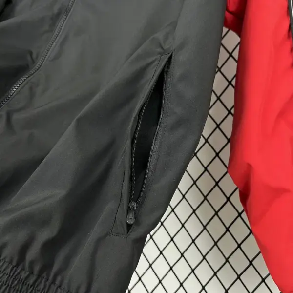 19 MNU red and black windreaker
