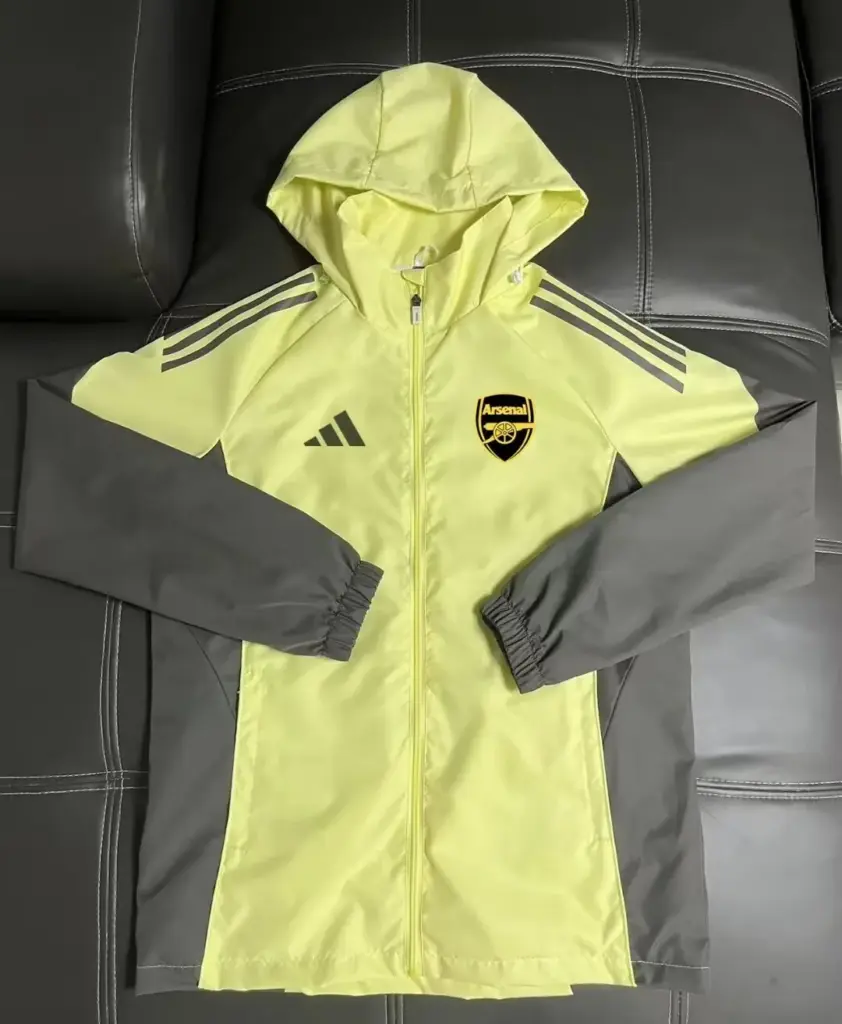 Arsenal football uniform yellow trench coat