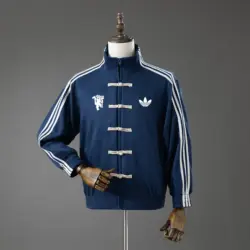 Manchester United Tang suit opposition bid