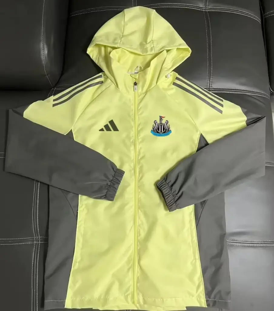 Newcastle football uniform yellow trench coat