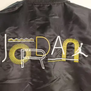 Jordan black windbreaker 110